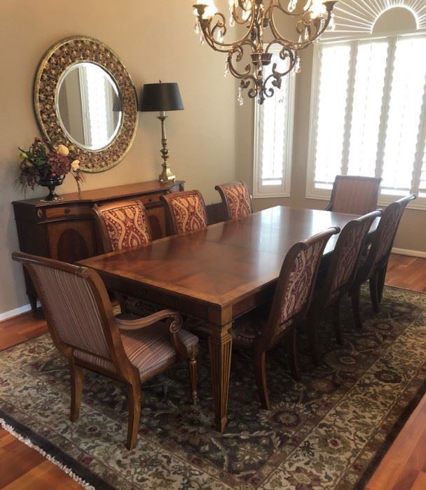 Ethan Allen Dining Table w 6 Adison Side Chairs and 2 Arm Chairs and Sideboard                                                                                                                
Round Florentine Mirror                                                        Leah Antique Brass Table Lamp (pair)                 
Agra Brown/Gold Area Rug 8'6" x 11'           
Centerpiece