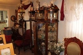 oak curved-glass curio; four doors