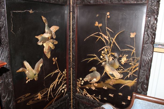 wood screen, raised carved ducks