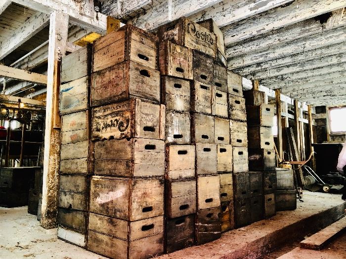 Hundreds of antique wood beer & soda crates