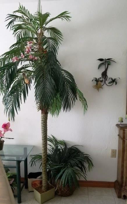 Tall artificial palm tree in small pot.  Woven basket with silk foilage
