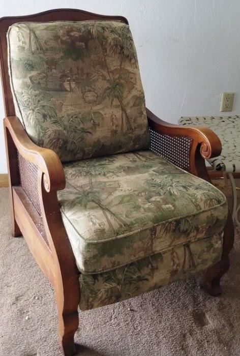 Palm tree fabric upholstered wood and cane recliner