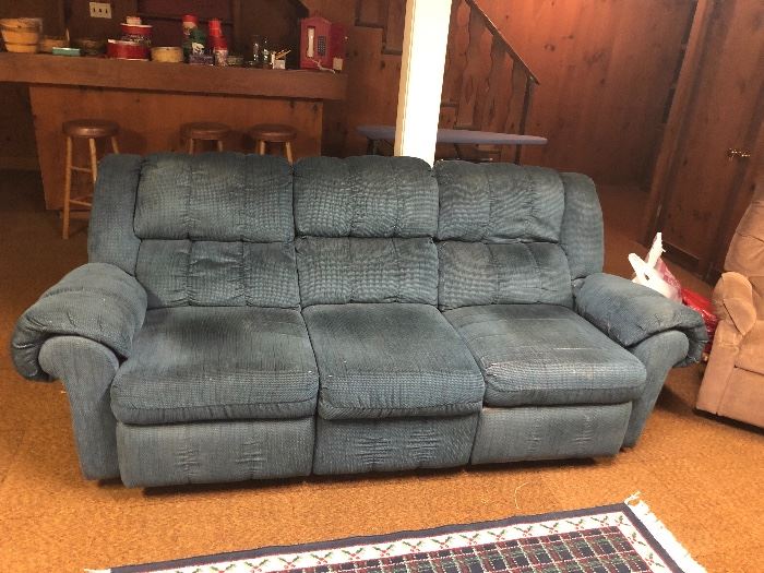 AVAILABLE  NOW FOR PRE-SALE
* Blue Dual Recliner Sofa 93 Inches Long Located in Walk-Out Basement