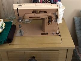 Singer Sewing Machine in Cabinet