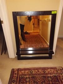 Black framed mirror with shelf
