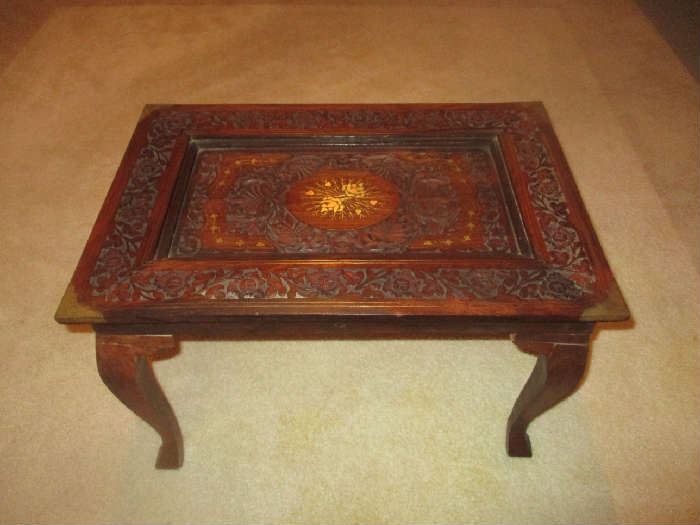 Inlaid and carved end table