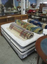 King size bed and floor rugs