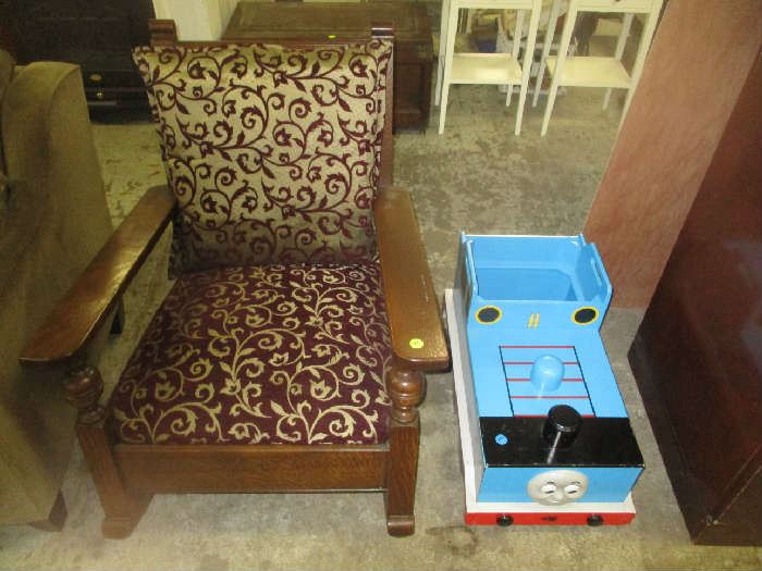 Oak rocking chair and train storage cabinet