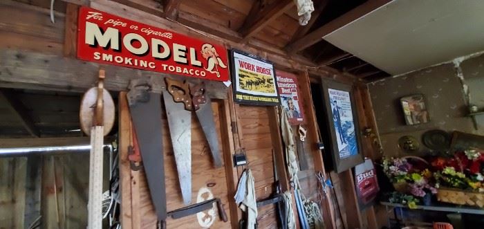 tools and antique advertising signs