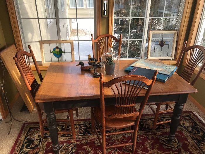 Dining table, set of 4 chairs and one extra leaf, leaded and stained glass windows