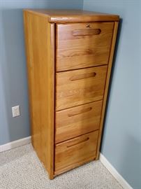 Oak four drawer file cabinet