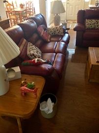 Leather sofa with recliners on each end