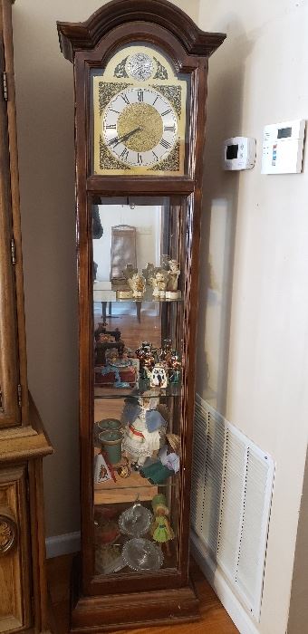 Display cabinet with Clock