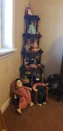 Corner Shelf with collectible dolls
