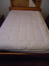 Futon like mattress on the slat bedframe