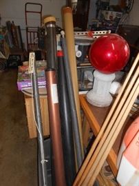 Cue sticks - fishing rod holders