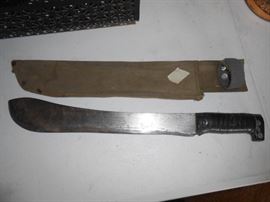 Machette with sleeve