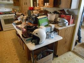Kitchen pots/pans, helmet, CD dash component 
