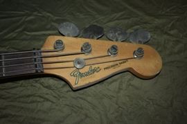 Autographed John Entwistle Fender Guitar won through a contest in 1989 during the "Tommy Tour" with Pete Townsend. The guitar was part of a radio contest here in Nashville in which they gave away the autographed John Entwistle Guitar on Thursday night and an autographed Pete Townsend Guitar on Friday night. A member of the Shelhart Family entered the contest and won this Guitar. It was made in Japan and has no serial number on the back plate. Who will be the fortunate person to win this Beautiful, Nostalgic, Valuable Guitar?