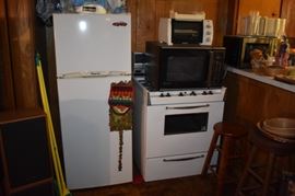 Apt. size Refrigerator/Freezer, Gas Stove, Microwave, and Toaster Oven