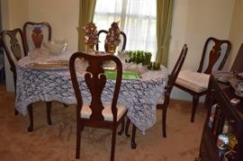 Beautiful Dining Table with 6 Matching Chairs and large Leaf also shown: Table Cloth, Crystal and More!