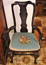 18th century George II black carved chair. Chinoiserie decoration.