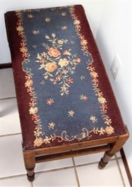 Hand embroidered foot stool.