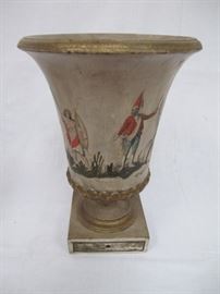 carved wooden vase on pedestal