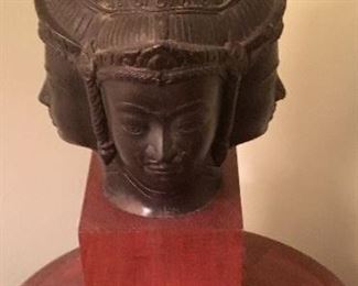 Mounted four head bronze Buddha