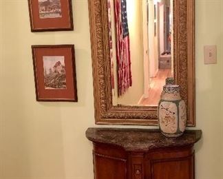 Hall credenza, antique framed mirror, French paintings