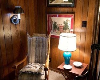 Antique oak rocking chair and a pair of signed prints by