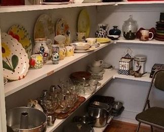 Butlers pantry full of serving pieces, china from around the world and collectible art glass and pottery, vintage cookware