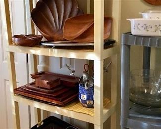 Varied collection of Teak and other wood serving trays, bowls and utensils 