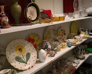 Butlers pantry full of serving pieces, china from around the world and collectible art glass and pottery