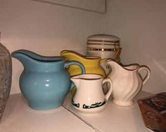 Collection of pottery cream pitchers