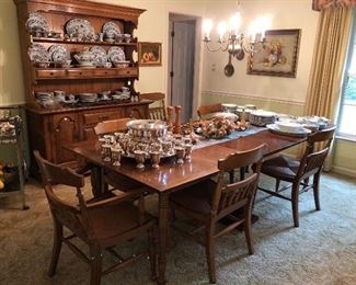 Dinning room table and hutch with six chairs.  Made of solid hard rock maple.   There is one arm chair.  Also available four matching chairs from another sale.   Table will seat 10. 