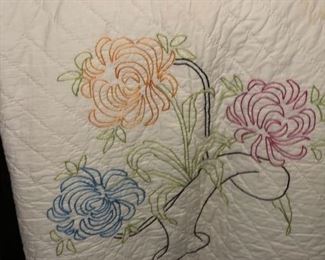 Hand embroidery flower basket quilt with hand quilting.  Most likely completed in the 1930’s