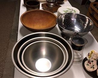 Wooden dough bowl along with other stainless items
