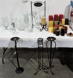 LOT OF IRON CANDLE STANDS AND CANDLES