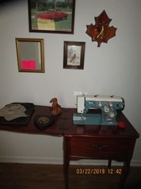 Vintage Sewing Machine in Cabinet.....