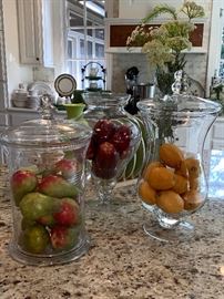 Great selection of artificial fruits and containers