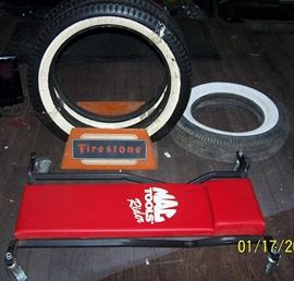 Old Firestone tire advertising display, tires and MAC creeper