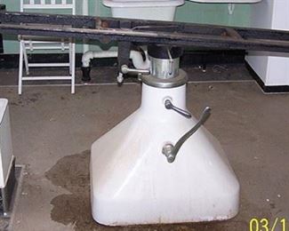 Porcelain base embalming table frame only (table missing) and drain