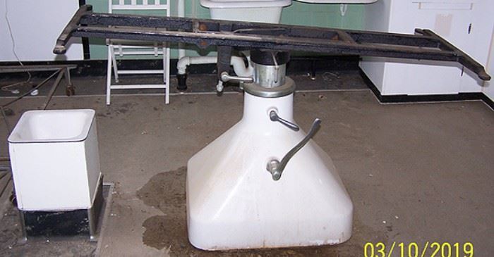 Porcelain base embalming table frame only (table missing)  and drain