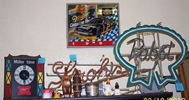 More Beer advertising neon lights, mirror and clock