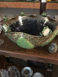 Signed art pottery with frogs on the edges 