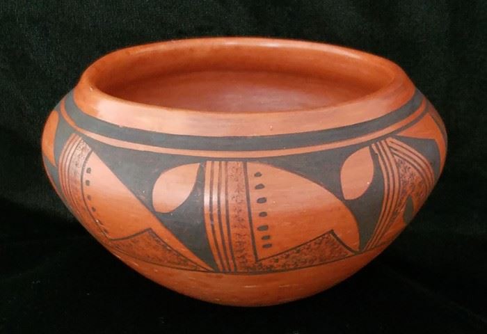 Hopi black on red jar, 6 1/2" in diameter and 3 1/2" tall. No signature.