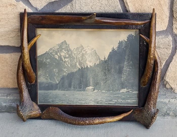 Stephen N. Leek photograph of the Teton Mountains with elk antler points from the historic Leeks Lodge in Jackson, Wyoming.