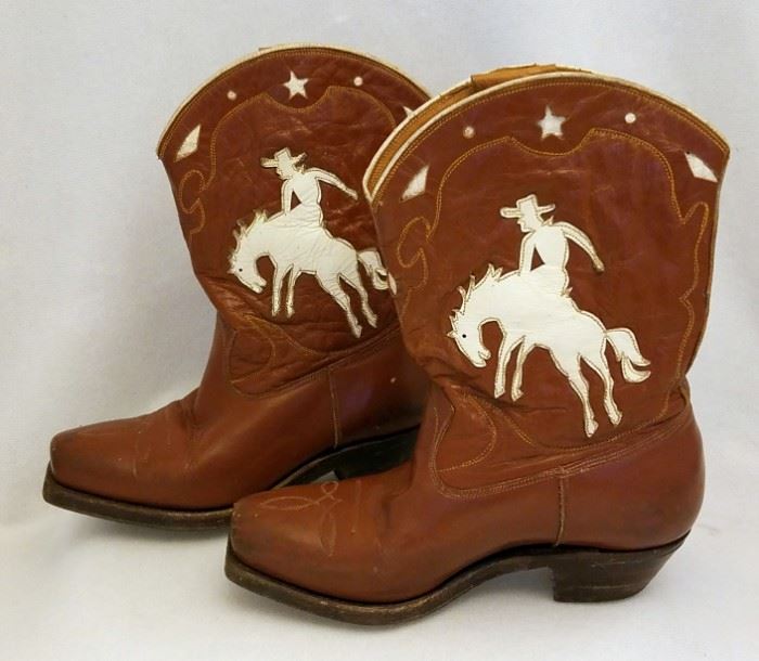 Vintage childs cowboy boots with cowboy on bucking horse