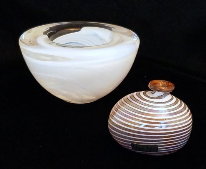 Scandinavian art glass, incuding an "Atoll" votive candle holder, 4 1/2" tall and 3 1/2" wide, signed Kosta Boda and designed by Anna Ehrner. The miniature vase has the Kosta Boda label, and is signed "B. Vallien Artist Coll Y8530"; it measures 2" tall and 2 1/2" wide and was designed by Bertil Vallien.